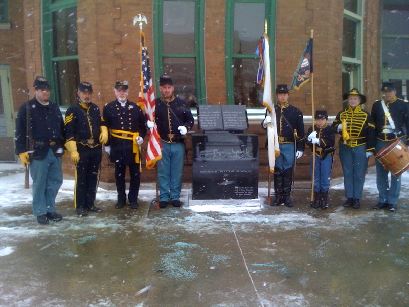 The 10th Cavalry presents the Colors at the Amtrak Depot in Springfield, February 2010, for the Funeral train monument.
